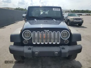 2013 Jeep Wrangler Unlimited Sport z VIN 1C4BJWDG7DL509796, wystawiony jako Copart lot #55787455 z przebiegiem 178 907 mil mil oraz Nie do naprawy • Non repairable. Historia ofert i sprzedaży dostępna na DreamBid. Obrazek 5.