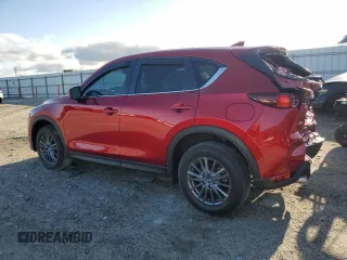 2021 Mazda CX-5 Touring with VIN JM3KFACM9M1326706, listed as a Copart auction lot 52357985 with 36,071 mi miles and Salvage Title. Bid and sale history available at carsss.com. Image 2.