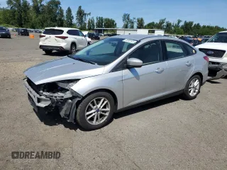 2018 Ford Focus SE z VIN 1FADP3F28JL324505, wystawiony jako Copart lot #58399145 z przebiegiem 72 110 mil mil oraz Szkoda całkowita • Salvage title. Historia ofert i sprzedaży dostępna na DreamBid. Obrazek 1.