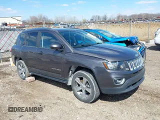 2016 Jeep Compass High Altitude Edition with VIN 1C4NJCEA3GD760934, listed as a IAAI auction lot 42028621 with 102,498 mi miles. Bid and sale history available at carsss.com. Image 1.