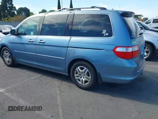 2006 Honda Odyssey EX-L z VIN 5FNRL38706B075356, wystawiony jako IAAI lot #42021960 z przebiegiem 120 455 mil mil oraz . Historia ofert i sprzedaży dostępna na DreamBid. Obrazek 14.