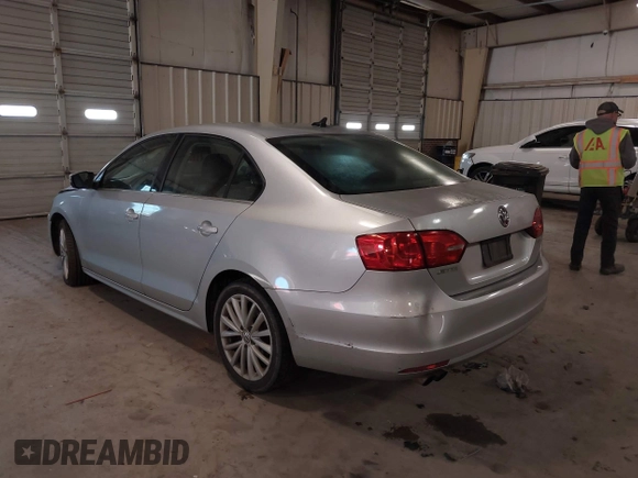 2012 Volkswagen Jetta Sedan SEL w/Sunroof with VIN 3VWLX7AJ4CM344390, listed as a IAAI auction lot 41439880 with 220,093 mi miles. Bid and sale history available at carsss.com. Image 3.