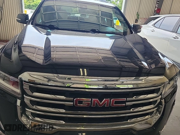2021 GMC Acadia SLT z VIN 1GKKNULS0MZ183324, wystawiony jako IAAI lot #42404046 z przebiegiem 29 062 mil mil oraz . Historia ofert i sprzedaży dostępna na DreamBid. Obrazek 23.