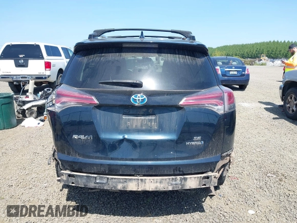 2018 Toyota RAV4 Hybrid SE with VIN JTMJJREV9JD191552, listed as a IAAI auction lot 42158665 with 84,025 mi miles and . Bid and sale history available at DreamBid. Image 16.