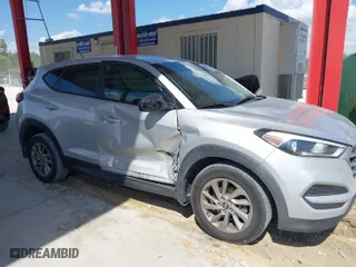 2018 Hyundai Tucson SE with VIN KM8J23A48JU646278, listed as a IAAI auction lot 41941577 with 115,228 mi miles. Bid and sale history available at carsss.com. Image 6.