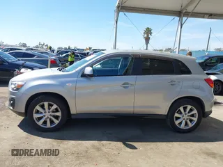 2014 Mitsubishi Outlander Sport ES with VIN 4A4AP3AUXEE003879, listed as a IAAI auction lot 41862379 with 65,297 mi miles. Bid and sale history available at carsss.com. Image 14.