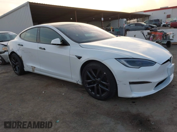 2022 Tesla Model S with VIN 5YJSA1E57NF483768, listed as a IAAI auction lot 41069339 with 35,342 mi miles and . Bid and sale history available at DreamBid. Image 1.