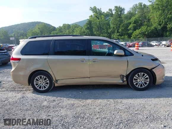 2011 Toyota Sienna XLE AAS with VIN 5TDYK3DC7BS008535, listed as a IAAI auction lot 42589645 with 208,624 mi miles and . Bid and sale history available at DreamBid. Image 13.