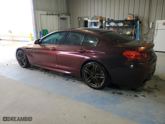 2016 BMW 6 Series 650i xDrive with VIN WBA6D6C55GGF94711, listed as a Copart auction lot 52917475 with 103,965 mi miles and Non Repairable. Bid and sale history available at carsss.com. Image 2.