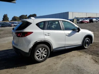 2013 Mazda CX-5 Sport with VIN JM3KE2BE7D0148951, listed as a Copart auction lot 57782115 with 65,677 mi miles and Salvage title. Bid and sale history available at DreamBid. Image 3.