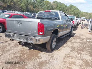 2005 Dodge 1500 SLT with VIN 1D7HA18N95S210796, listed as a IAAI auction lot 40763914 with 216,415 mi miles. Bid and sale history available at carsss.com. Image 4.