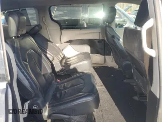 2018 Chrysler Pacifica Touring L z VIN 2C4RC1BGXJR142653, wystawiony jako Copart lot #50708575 z przebiegiem 136 816 mil mil oraz Szkody całkowita. Historia ofert i sprzedaży dostępna na DreamBid. Obrazek 11.