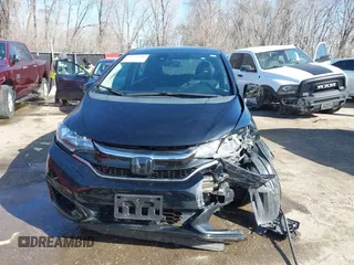 2019 Honda Fit EX z VIN 3HGGK5H86KM716757, wystawiony jako IAAI lot #41749738 z przebiegiem 89 132 mil mil oraz . Historia ofert i sprzedaży dostępna na DreamBid. Obrazek 12.