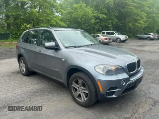 2011 BMW X5 35i z VIN 5UXZV4C55BL406962, wystawiony jako Copart lot #59301695 z przebiegiem 87 215 mil mil oraz Czysty tytuł • Clean title. Historia ofert i sprzedaży dostępna na DreamBid. Obrazek 1.