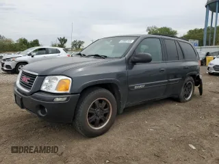 2004 GMC Envoy SLT with VIN 1GKDT13S842347943, listed as a Copart auction lot 57655165 with 135,885 mi miles and Salvage title. Bid and sale history available at DreamBid. Image 1.