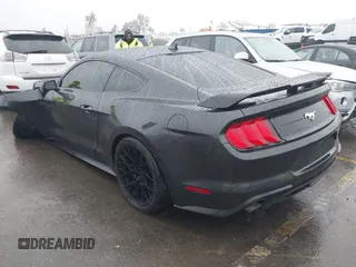 2023 Ford Mustang EcoBoost with VIN 1FA6P8TH8P5111792, listed as a IAAI auction lot 41565345 with 42,906 mi miles. Bid and sale history available at carsss.com. Image 3.