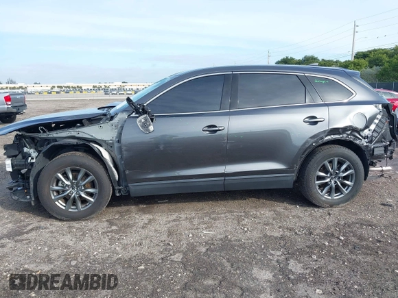 2020 Mazda CX-9 Touring z VIN JM3TCACY5L0412308, wystawiony jako IAAI lot #41208401 z przebiegiem 37 029 mil mil oraz . Historia ofert i sprzedaży dostępna na DreamBid. Obrazek 6.