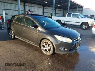 2014 Ford Focus SE with VIN 1FADP3K28EL280131, listed as a IAAI auction lot 41855740 with 2,114,995 mi miles. Bid and sale history available at carsss.com. Image 1.