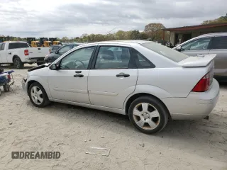 2006 Ford Focus S with VIN 1FAHP34N56W109006, listed as a Copart auction lot 53987745 with 111,677 mi miles and Salvage Title. Bid and sale history available at carsss.com. Image 2.