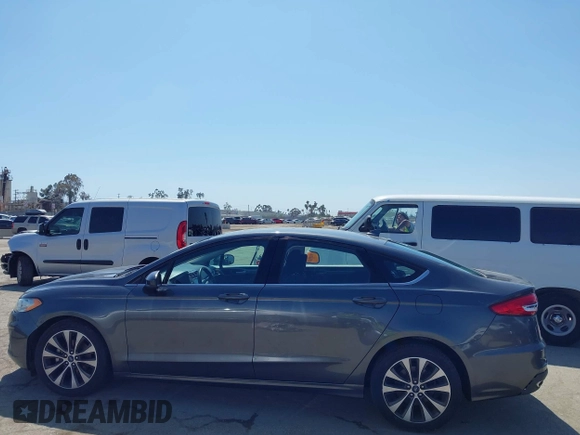 2020 Ford Fusion SE with VIN 3FA6P0T99LR173347, listed as a IAAI auction lot 42090457 with 118,359 mi miles and . Bid and sale history available at DreamBid. Image 14.