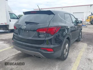 2018 Hyundai Santa Fe 2.4L with VIN 5XYZT3LB5JG539917, listed as a IAAI auction lot 41975300 with 214,562 mi miles and . Bid and sale history available at DreamBid. Image 4.
