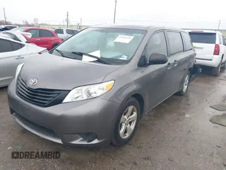 2015 Toyota Sienna L with VIN 5TDZK3DC9FS563593, listed as a IAAI auction lot 41466419 with 136,394 mi miles and . Bid and sale history available at DreamBid. Image 17.