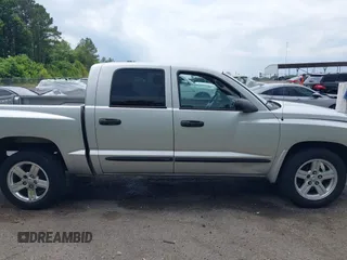 2007 Dodge Dakota SLT z VIN 1D7HE48K27S127788, wystawiony jako IAAI lot #42311626 z przebiegiem 357 130 mil mil oraz . Historia ofert i sprzedaży dostępna na DreamBid. Obrazek 14.