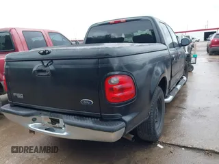 2003 Ford F-150 XLT with VIN 1FTRW07683KC30930, listed as a IAAI auction lot 42482529 with Not provided miles and . Bid and sale history available at DreamBid. Image 4.