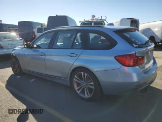 2014 BMW 3 Series 328i xDrive with VIN WBA3G7C52EKN36613, listed as a Copart auction lot 82602954 with 129,492 mi miles and Salvage Title. Bid and sale history available at carsss.com. Image 2.