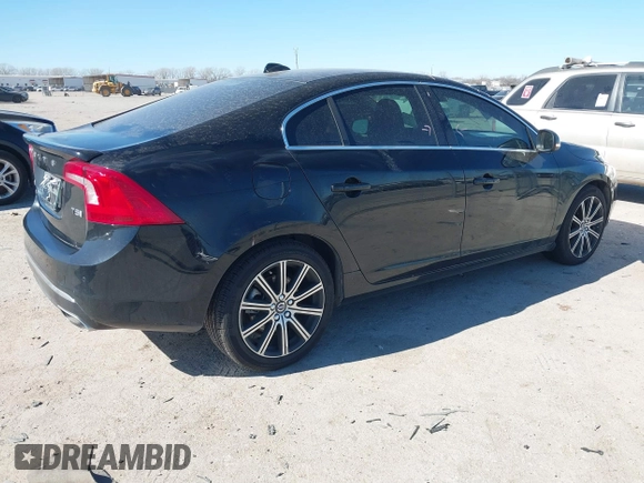 2018 Volvo S60 Inscription Platinum with VIN LYV402HM1JB156380, listed as a IAAI auction lot 41408529 with 106,933 mi miles. Bid and sale history available at carsss.com. Image 4.