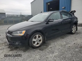 2014 Volkswagen Jetta Comfortline z VIN 3VWDL7AJ2EM366052, wystawiony jako Copart lot #69010344 z przebiegiem 210 092 mil mil oraz Szkoda całkowita • Salvage title. Historia ofert i sprzedaży dostępna na DreamBid. Obrazek 1.
