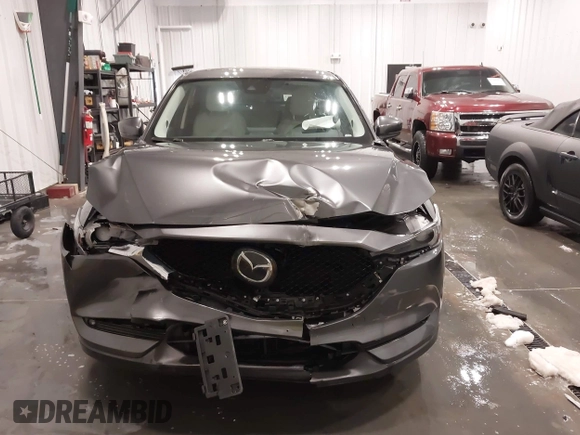 2017 Mazda CX-5 Grand Touring with VIN JM3KFADLXH0151593, listed as a IAAI auction lot 41823378 with 149,299 mi miles. Bid and sale history available at carsss.com. Image 6.