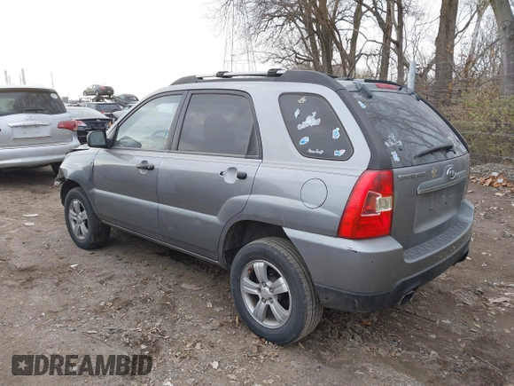 2009 Kia Sportage LX with VIN KNDJF724997570871, listed as a IAAI auction lot 41003267 with 231,654 mi miles and . Bid and sale history available at carsss.com. Image 3.