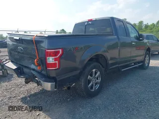 2018 Ford F-150 XL with VIN 1FTFX1E58JFD92806, listed as a IAAI auction lot 42424589 with 144,476 mi miles and . Bid and sale history available at DreamBid. Image 4.