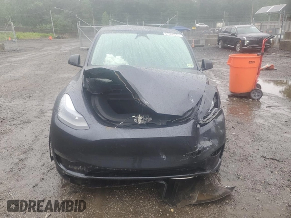 2024 Tesla Model Y z VIN 7SAYGDEDXRF076893, wystawiony jako Copart lot #57966515 z przebiegiem 9 200 mil mil oraz Szkoda całkowita • Salvage title. Historia ofert i sprzedaży dostępna na DreamBid. Obrazek 5.