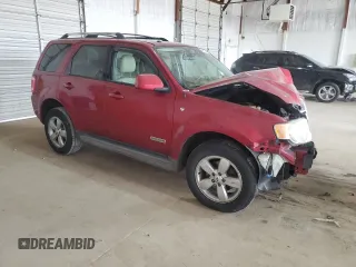 2008 Ford Escape Limited с VIN 1FMCU94128KC06599, выставлен на аукционе Copart как лот 48647495 с пробегом Не указан миль и Списание • Salvage title. История ставок и продаж доступна на DreamBid. Изображение 4.