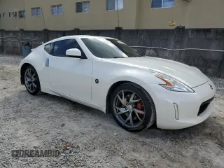 2014 Nissan 370Z Touring with VIN JN1AZ4EH6EM630690, listed as a Copart auction lot 43939795 with 66,797 mi miles and Salvage Title. Bid and sale history available at carsss.com. Image 4.