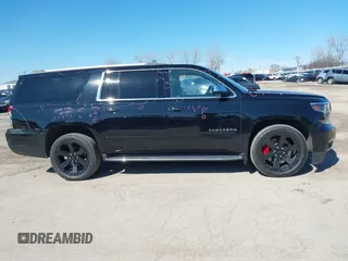 2017 Chevrolet Suburban Premier with VIN 1GNSKJKC8HR285321, listed as a IAAI auction lot 41796659 with 128,113 mi miles and . Bid and sale history available at DreamBid. Image 13.