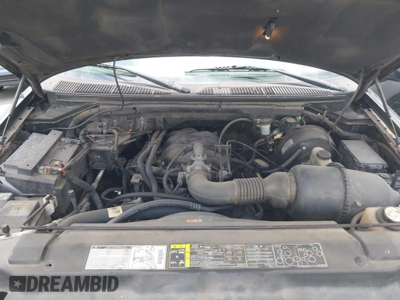 2002 Ford F-150 XL with VIN 1FTRX17202NA21470, listed as a IAAI auction lot 42098554 with 149,840 mi miles. Bid and sale history available at carsss.com. Image 10.