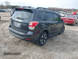 2018 Subaru Forester Premium with VIN JF2SJAGC0JH452501, listed as a IAAI auction lot 41871403 with 65,412 mi miles. Bid and sale history available at carsss.com. Image 4.