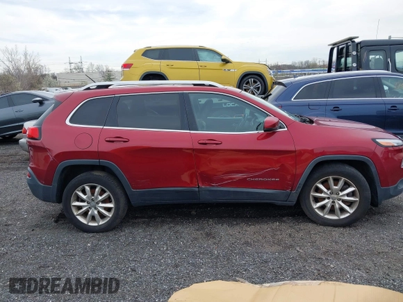 2015 Jeep Cherokee Limited with VIN 1C4PJMDS4FW544604, listed as a IAAI auction lot 41961706 with Not Provided miles and . Bid and sale history available at DreamBid. Image 13.