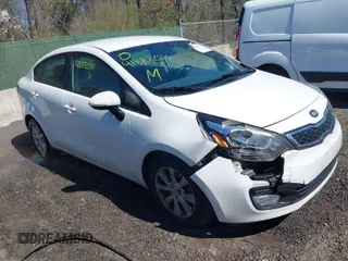 2014 Kia Rio EX with VIN KNADN4A34E6397779, listed as a IAAI auction lot 41882076 with 110,048 mi miles. Bid and sale history available at carsss.com. Image 1.