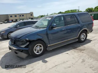 2002 Ford Expedition Eddie Bauer with VIN 1FMRU17L12LA63588, listed as a Copart auction lot 52289415 with 305,113 mi miles and Salvage title. Bid and sale history available at DreamBid. Image 1.