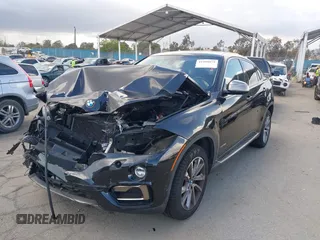2016 BMW X6 xDrive35i z VIN 5UXKU2C50G0N83968, wystawiony jako IAAI lot #41958971 z przebiegiem 70 738 mil mil oraz . Historia ofert i sprzedaży dostępna na DreamBid. Obrazek 17.