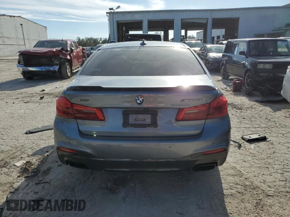 2018 BMW 5 Series M550i xDrive with VIN WBAJB9C53JB034947, listed as a Copart auction lot 77270534 with Not provided miles and Non repairable. Bid and sale history available at DreamBid. Image 6.