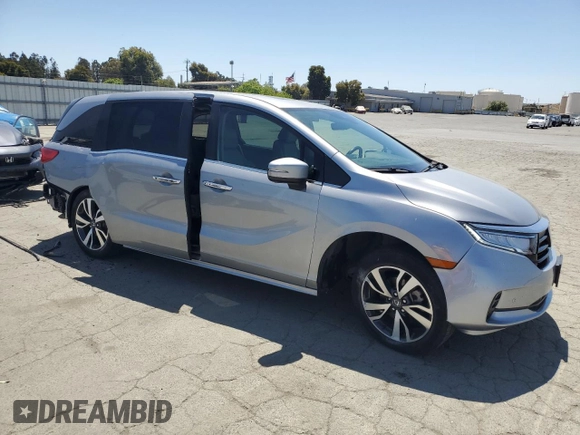 2023 Honda Odyssey Touring with VIN 5FNRL6H86PB043474, listed as a Copart auction lot 61672545 with 39,176 mi miles and Salvage title. Bid and sale history available at DreamBid. Image 4.