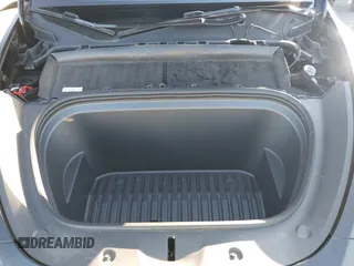 2024 Tesla Model Y Long Range with VIN 7SAYGDEEXRA216186, listed as a IAAI auction lot 41106653 with 25,331 mi miles and . Bid and sale history available at DreamBid. Image 10.