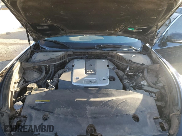 2015 Infiniti Q70 z VIN JN1BY1PR6FM830997, wystawiony jako Copart lot #41895875 z przebiegiem 203 061 mil mil oraz Szkoda całkowita • Salvage title. Historia ofert i sprzedaży dostępna na DreamBid. Obrazek 11.