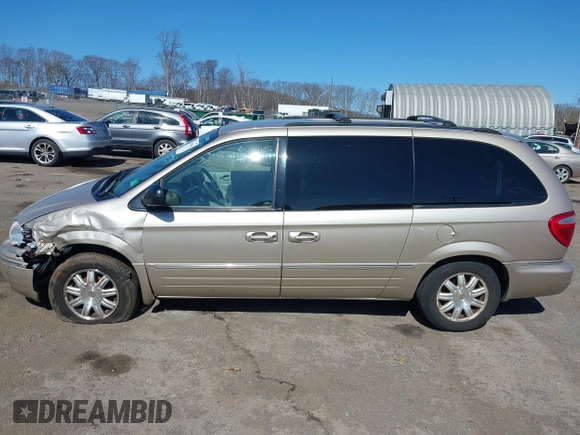 2006 Chrysler Town & Country Touring with VIN 2A8GP54L06R727898, listed as a IAAI auction lot 41893586 with 119,296 mi miles and . Bid and sale history available at DreamBid. Image 14.