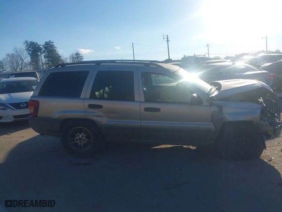 2004 Jeep Grand Cherokee Laredo with VIN 1J4GX48S44C284478, listed as a IAAI auction lot 41253167 with 1 mi miles. Bid and sale history available at carsss.com. Image 13.